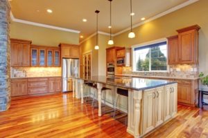 Spacious kitchen interior with kitchen island in luxury house worth $1 million dollars 